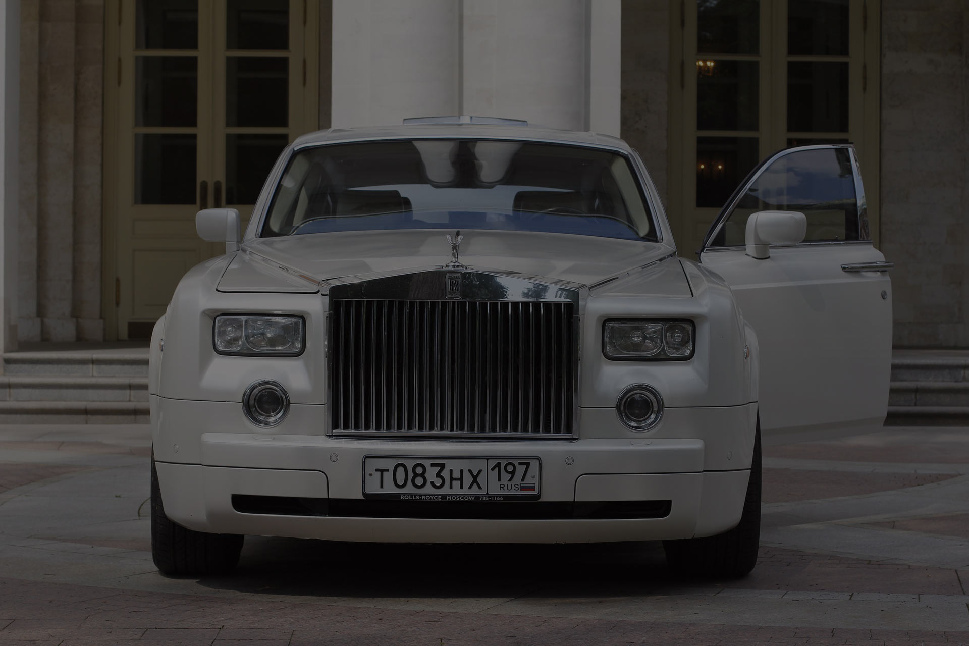 White luxury Rolls Royce that can be used for transportation service, for personal or business travel